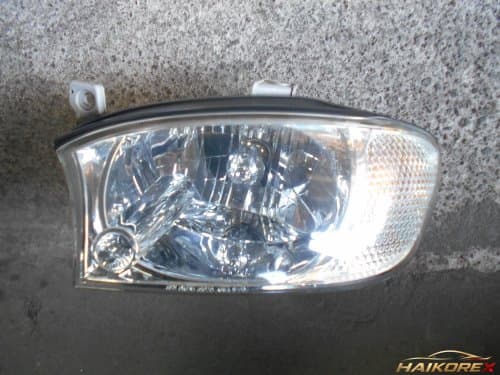 Фара передняя левая (водителя) Spectra Light старого образца 0K2N151040A, класс B (выцветание, трещина)