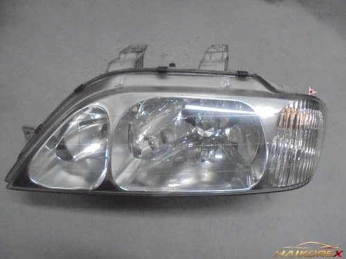 Фара левая (передняя, галогенная) Ssangyong New Musso Light (5 контактов) без верхнего резинового молдинга, совместима с Musso Sports