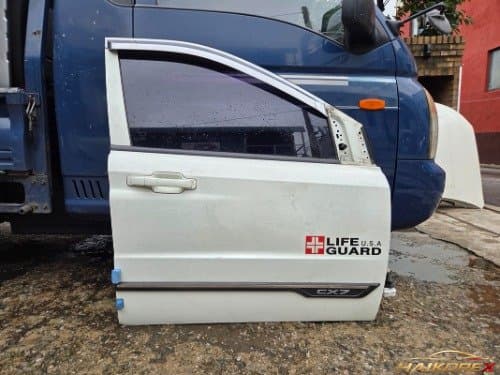 Передняя дверь Korando Sports, сторона пассажира