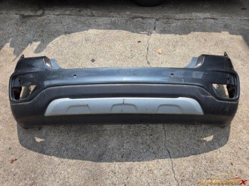 Накладка на задний бампер Chevrolet Trax верхняя часть 42533012 + нижняя 42646455 + юбка 42533011 (4 отверстия под датчики)