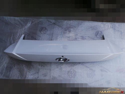 Спойлер двери-крышки багажника и молдинг задней панели багажника Elantra CN7 87360AA020WAW