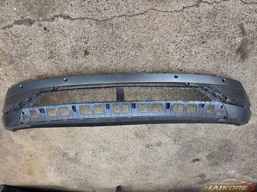 Накладка переднего бампера нижняя Ioniq 5 86512GI110 (4 отверстия под датчики) класс B (потёртости)