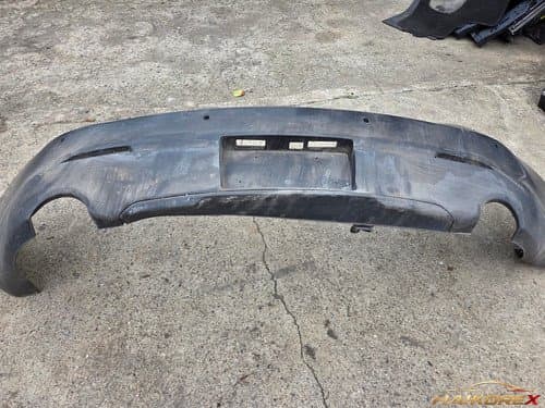 Накладка заднего бампера Ford Taurus 6 поколение DG1317D781 (4 отверстия под датчики) рестайл 13-18