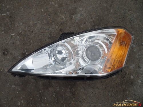 Левая фара головного света Hyundai Cayenne Light 8310109000 05-07