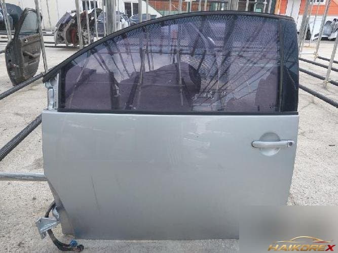 Volkswagen Beetle 2011 — передняя дверь левая