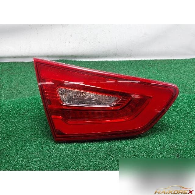 Kia K5 Hybrid 2014 — накладка крышки багажника левая 92403-4U510