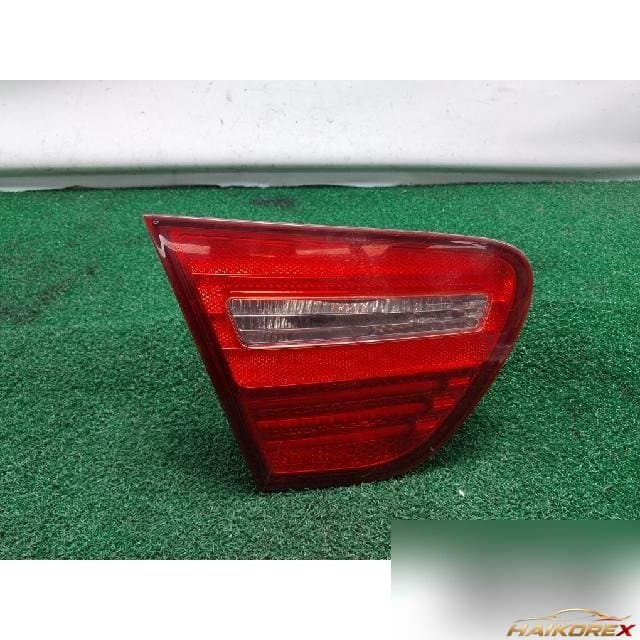 Hyundai Avante HD 2008 — наличник крышки багажника левый с фонарём номера 92403-2H0