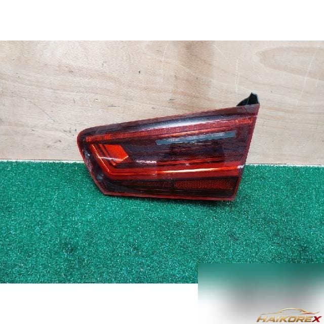 Audi A6 2016 — накладка крышки багажника правая (в сборе с фонарём) 4G5 945 094 E