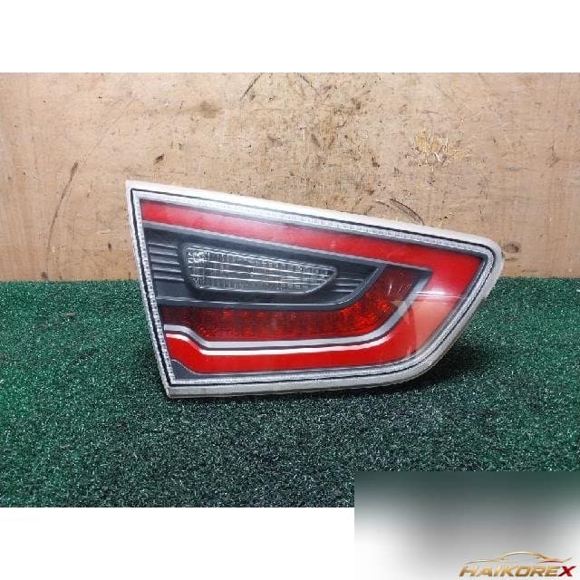Kia K5 Hybrid 2014 — накладка крышки багажника левая 924034U510