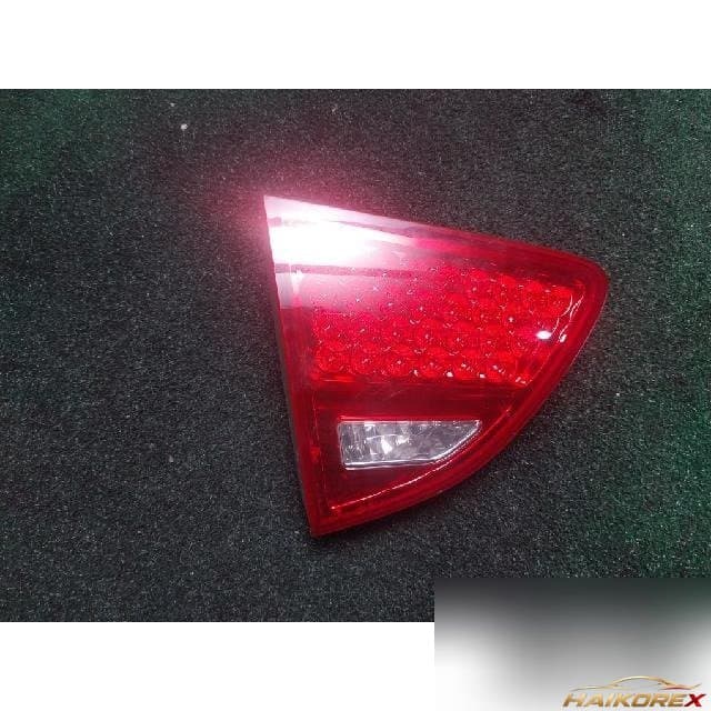 Hyundai Veracruz 2009 — накладка крышки багажника левая с фонарём подсветки номера 9240-3J1