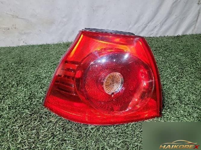 Volkswagen Golf 2009 — задний фонарь левый (наружный)