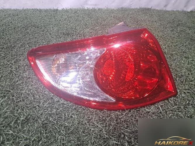 Hyundai Santa Fe 2011 — фонарь задний левый наружный (4 контакта)
