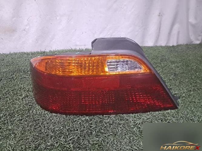 Honda Acura 2000 — задний фонарь левый (наружный)
