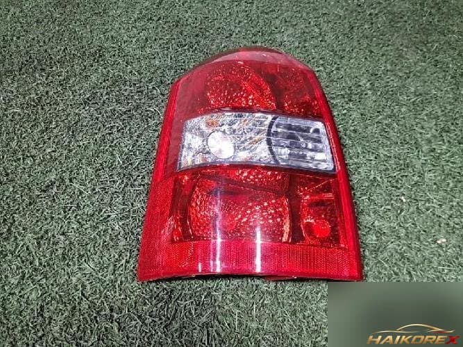 Hyundai Tucson 2007 — задний фонарь левый наружный 92401 2E100 2