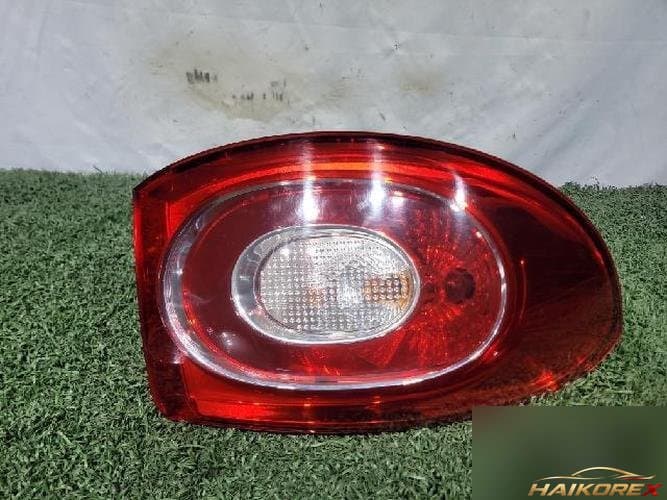 Volkswagen Tiguan 2011 — задний фонарь левый (внешний) 5N0945095H