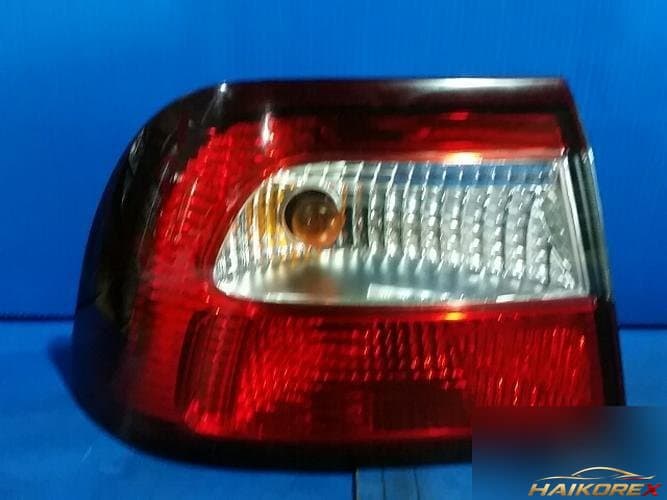 Renault SM5 2002 — задний фонарь левый (наружный)
