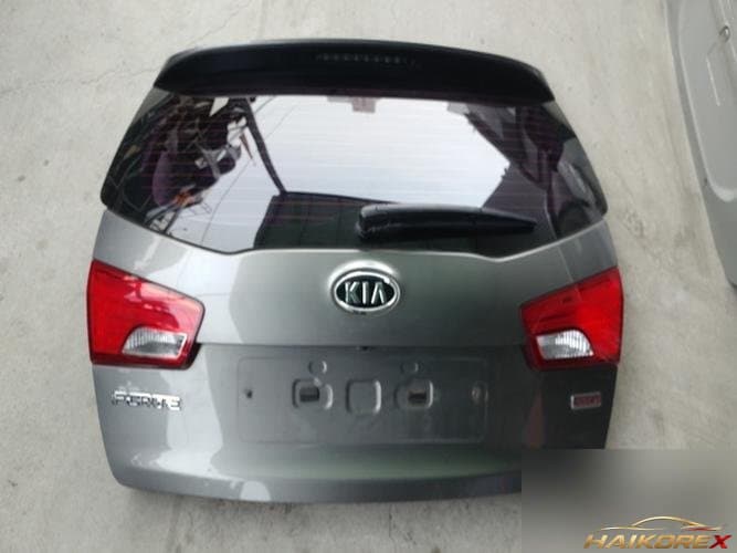 Kia Forte 2011 — крышка багажника