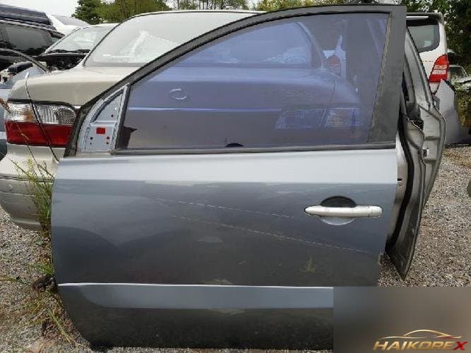 Renault QM5 2009 — дверь передняя левая