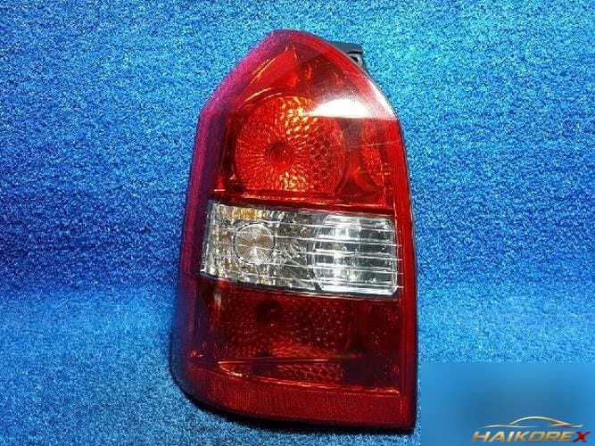 Hyundai Tucson 2007 — фонарь задний левый наружный 92401 2E100 6