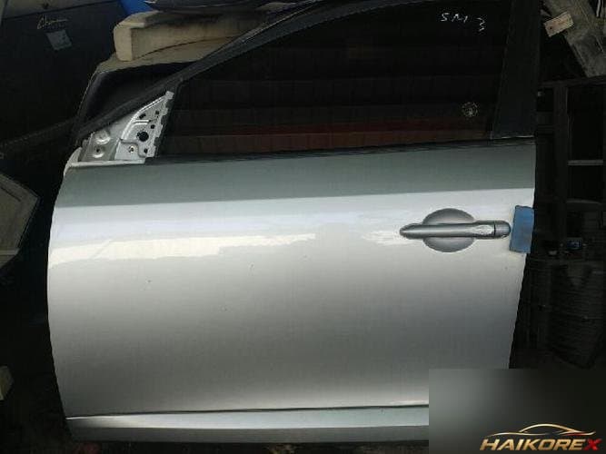 Renault SM3 2011 — передняя дверь левая