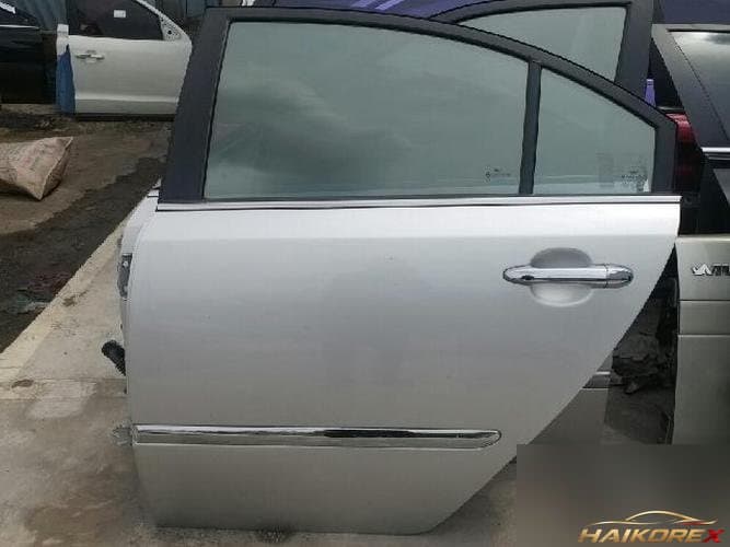 Kia Rondo 2009 — дверь задняя левая