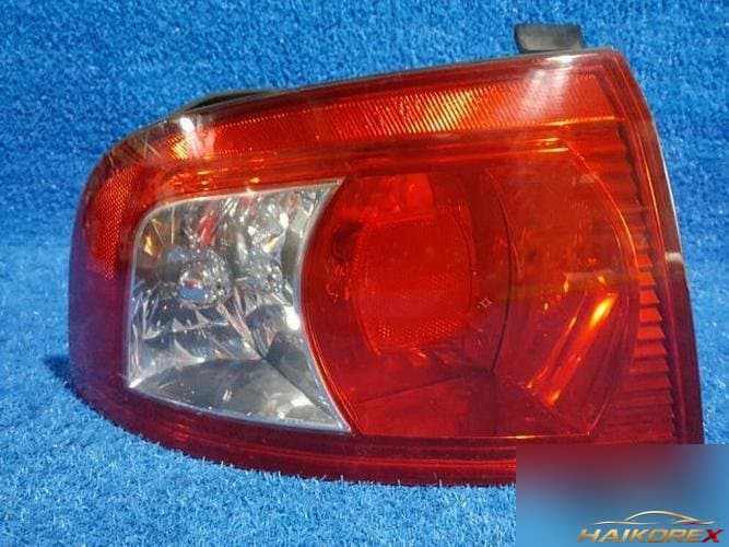 Kia Optima 2004 — задний фонарь левый наружный 5