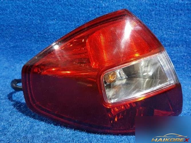 Renault QM5 2009 — задний фонарь левый внешний