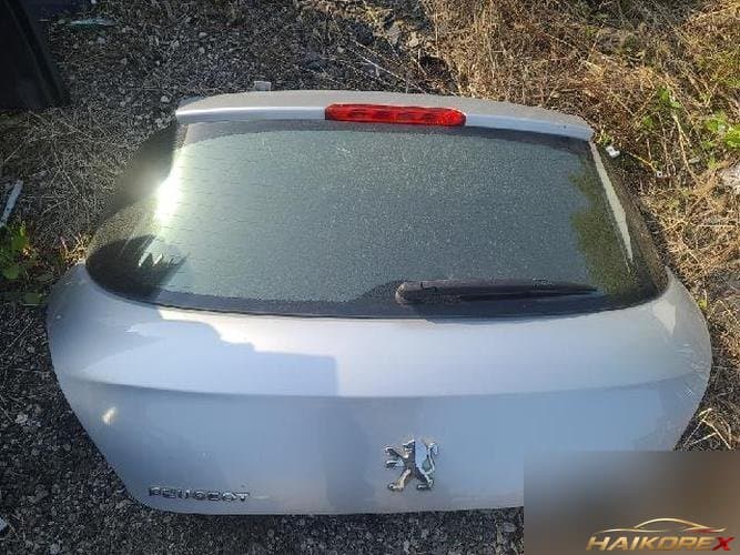 Peugeot 308 2011 — крышка багажника