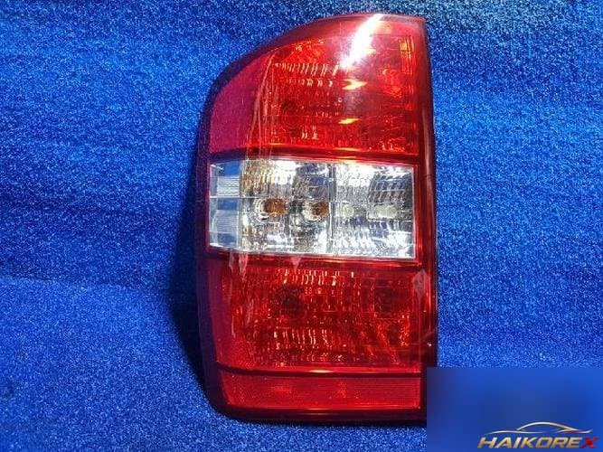 Kia Carnival 2009 — фонарь задний левый наружный 1
