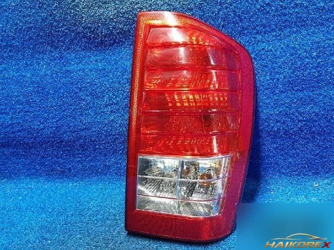 Kia Carnival 2010 — задний фонарь правый (наружный) 92402 4J000 2