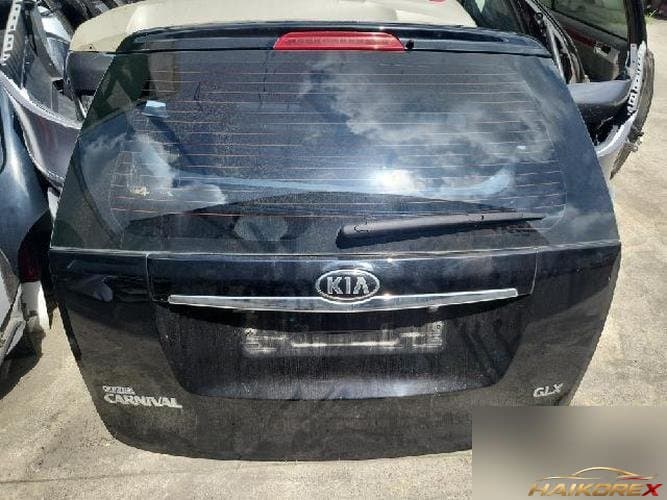 Kia Carnival 2010 — крышка багажника