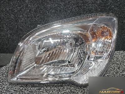 Kia Sportage 2009 — фара передняя