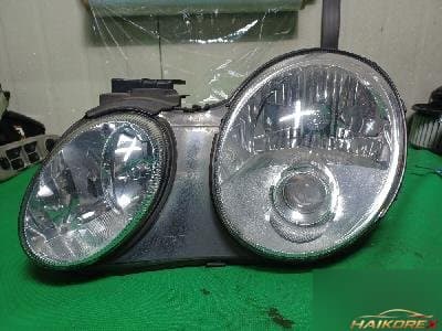 Kia Opirus 2009 — фара передняя
