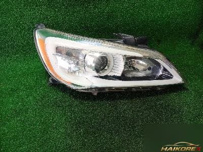 Kia K7 2010 — фара передняя