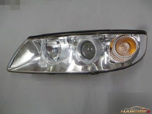 Фара передняя левая 921013L300