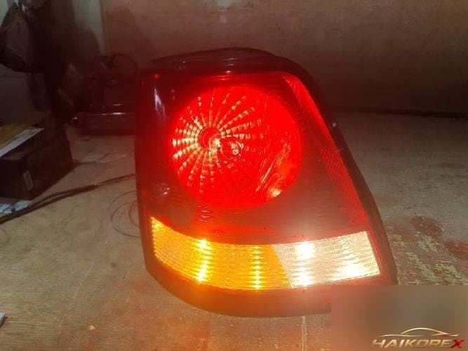 Kia Sorento 2005 — задний фонарь левый наружный 4