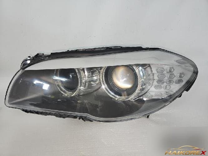 BMW 5 Series 2010 — фара левая 1EL 010 131-21