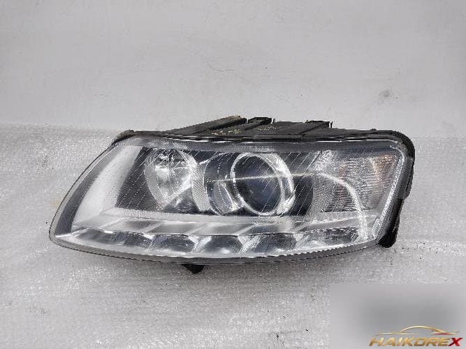 Audi A6 2006 — фара левая HID