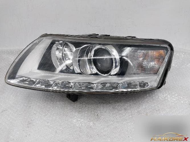 Audi A6 2008 — фара левая (HID)
