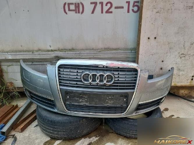 Audi A6 2009 — передний бампер