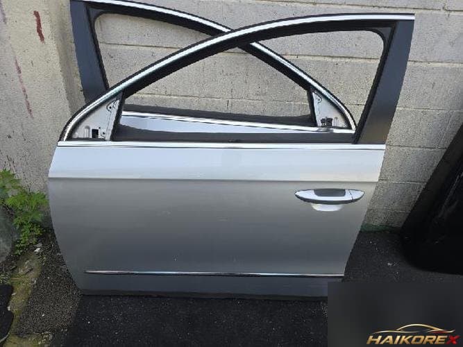 Volkswagen Passat 2007 — передняя дверь левая