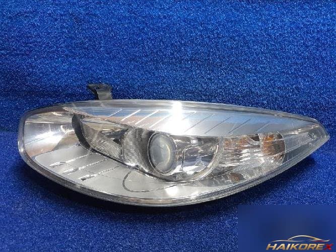 Renault SM3 2014 — фара левая 260601325R