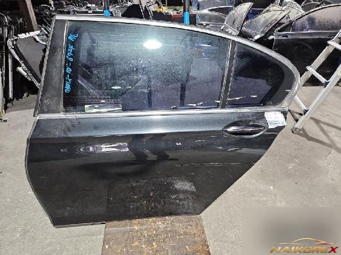 BMW 7 Series 2010 — дверь задняя левая 41007203981