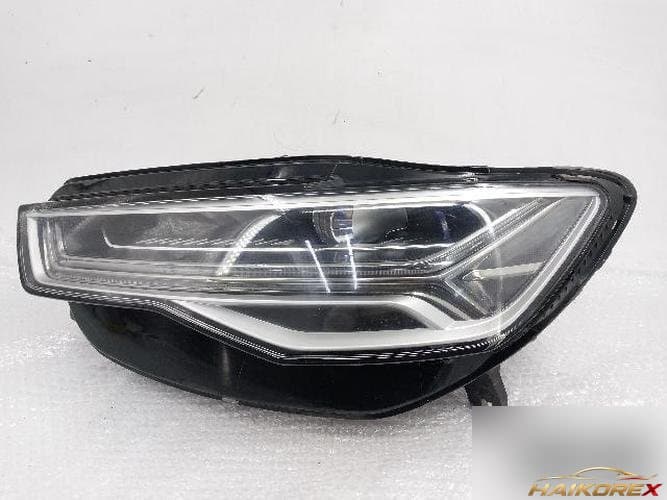 Audi A6 2013 — фара левая (водительская)
