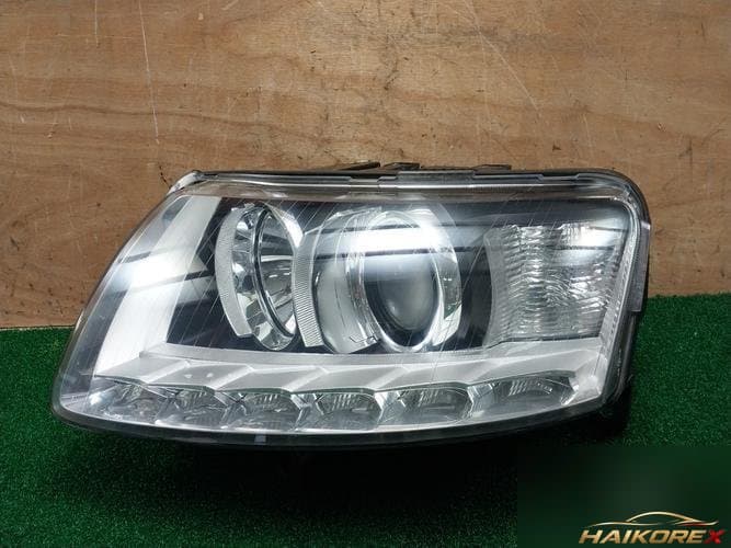 Audi A6 2010 — фара левая HID 4F0941003CP