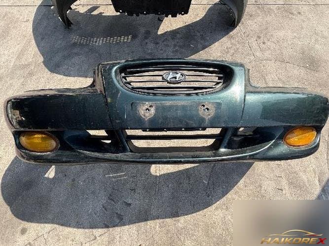 Hyundai Sonata 1996 — передний бампер с решеткой и противотуманками