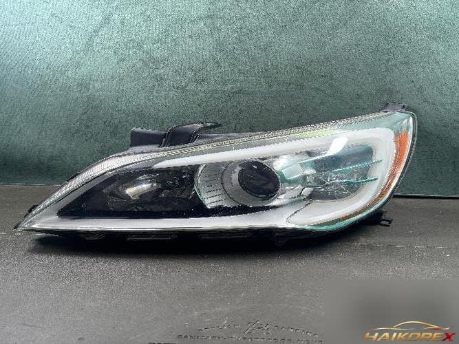 Kia K7 2012 — фара левая