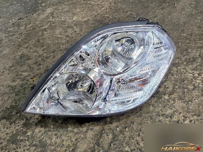 Renault SM7 2006 — фара левая