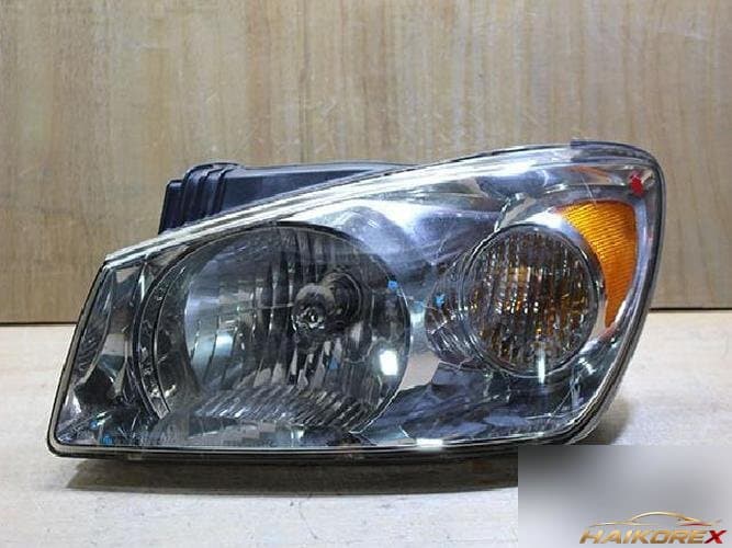 Kia Cerato 2004 — фара левая 1
