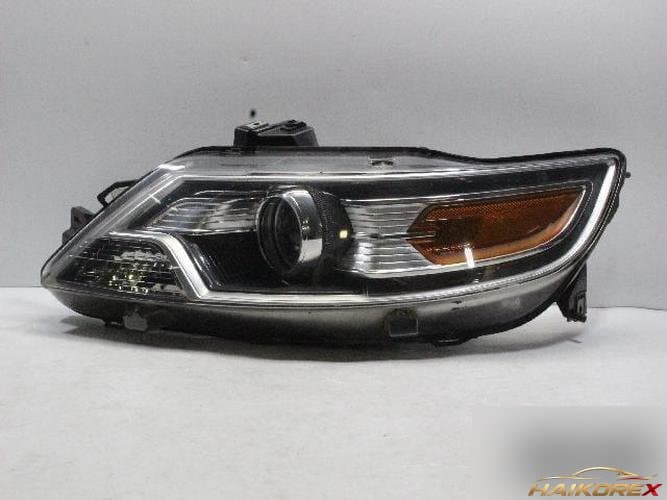 Ford Taurus 2011 — фара левая